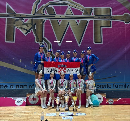 ['batonflag', 'Dvorana Krešimir Ćosić', 'glazba', 'mace', 'mažoret-sport', 'mažoretkinje', 'natjecanje', 'ples', 'Savez mažoretkinja', 'sezona 2024/2025', 'svjetsko prvenstvo', 'svjetsko srebro', 'svjetsko zlato', 'velikogoričke mažoretkinje', 'Višnjik', 'zadar']